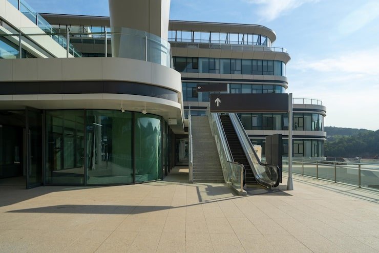 modern-architectural-building-with-escalator-glass-facade_1112-18567